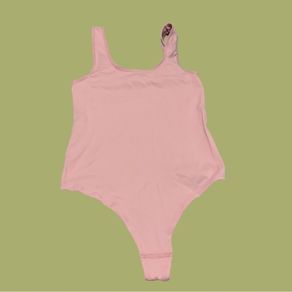 pink ribbed body suit